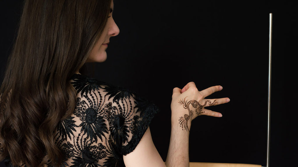 Woman with henna on hand