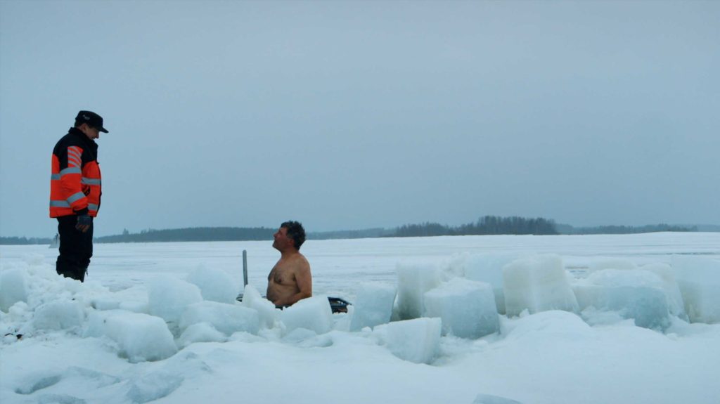 Two men ice fishing