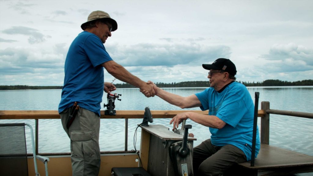 men on a fishing boat in Finland