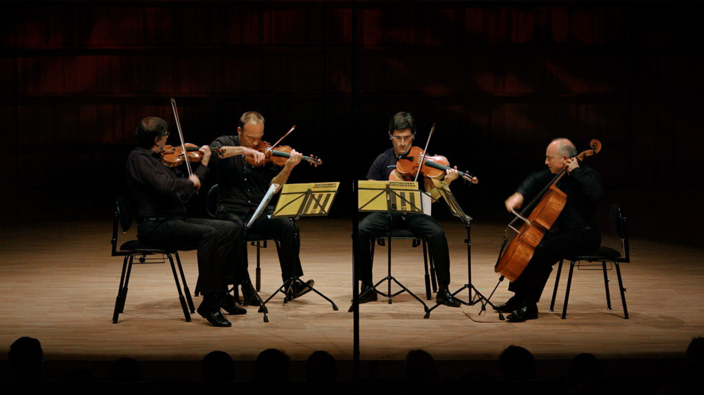 Symphony orchestra musicians on stage