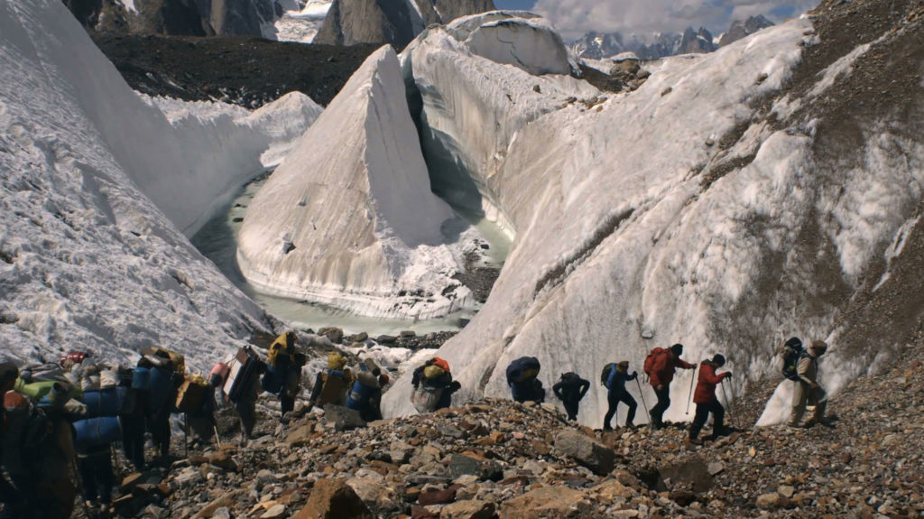 People hiking through the Karakorum Mountains